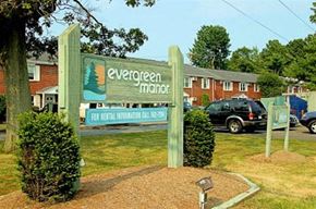 Westfield apartment for rent - a sign for evergreen magic in front of a parking lot