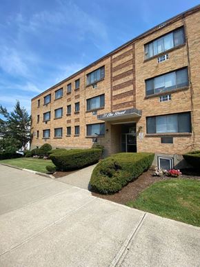 Worcester apartment for rent - a brick building with a sidewalk in front of it