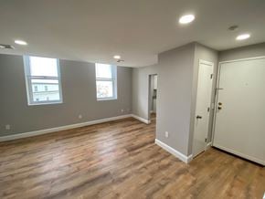 Worcester apartment for rent - Living room with laminate floors