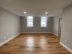 Worcester apartment for rent - Living room with laminate floors