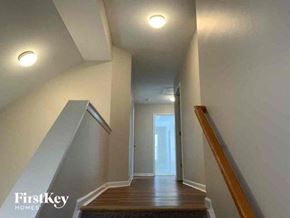 Stone Mountain house for rent - a hallway with stairs and a door in a house