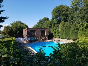 Johnston apartment for rent - a swimming pool in the backyard of a house