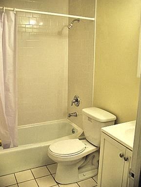 Clinton apartment for rent - a bathroom with a toilet and a tub and a sink