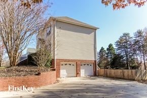 Clemmons house for rent - a church building with a garage and a driveway