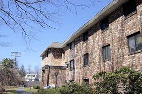 Worcester apartment for rent - the side of a brick building with a blue sky