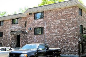 Worcester apartment for rent - a black truck parked in front of a brick building