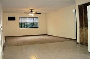 Worcester apartment for rent - an empty living room with a ceiling fan
