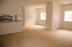Attleboro apartment for rent - an empty room with a kitchen and a living room