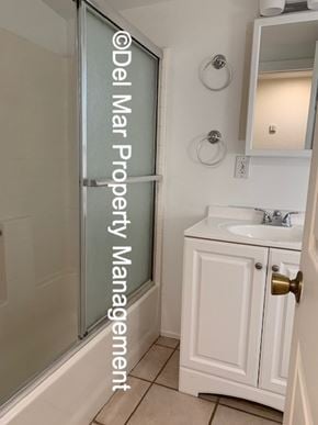 Grover Beach apartment for rent - A small white bathroom with a sink and a shower.