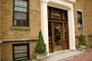 Cambridge apartment for rent - the front of a brick building with a wooden door