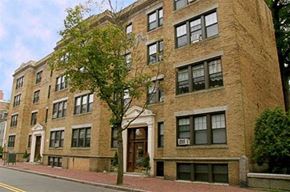 Cambridge apartment for rent - a large brick building with a tree in front of it