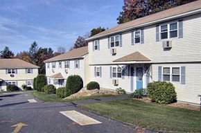Charlton apartment for rent - a white house with a yard and a street