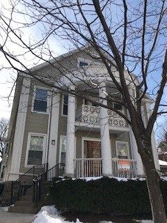 Buffalo apartment for rent - A house with a tree in front of it.