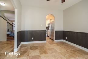 Baytown house for rent - the living room and dining room are open to the kitchen and entryway