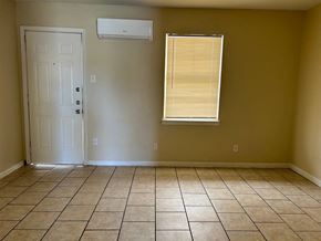 Killeen apartment for rent - a room with a tiled floor and a window and a door