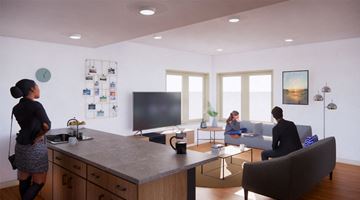 Medway apartment for rent - people in an office and living room with a desk and a tv