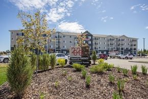Red Deer apartment for rent - A sign in front of a building that says 460 and 200 apartments.