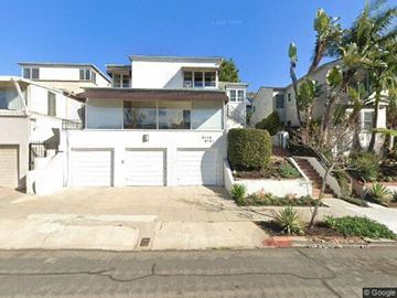 San Diego apartment for rent - a white house with a driveway in front of it