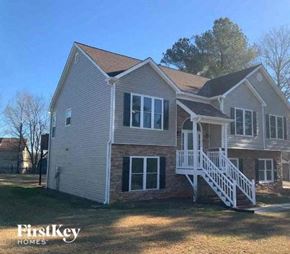 Powder Springs house for rent - the front of a house with a porch and stairs