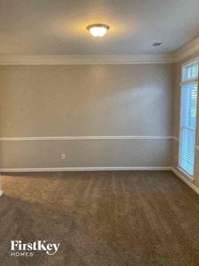Jonesboro house for rent - an empty living room with a large window