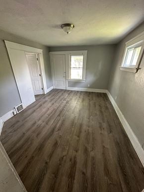 Cleveland apartment for rent - a empty living room with a wooden floor