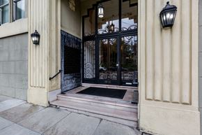 San Francisco apartment for rent - A black wrought iron gate with the number 1900 on it.