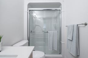 St. Thomas apartment for rent - a small bathroom with a shower and a toilet