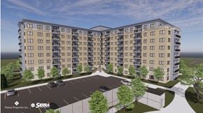 St. Thomas apartment for rent - a rendering of a large apartment building with trees and a parking lot