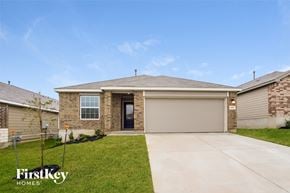 San Antonio house for rent - A house with a garage door is for sale by FirstKey Homes.