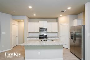 San Antonio house for rent - A kitchen with a marble countertop and stainless steel appliances.