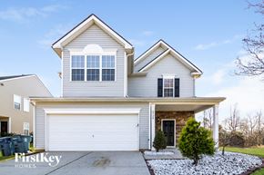 Whitsett house for rent - A two-story house with a garage is for sale.