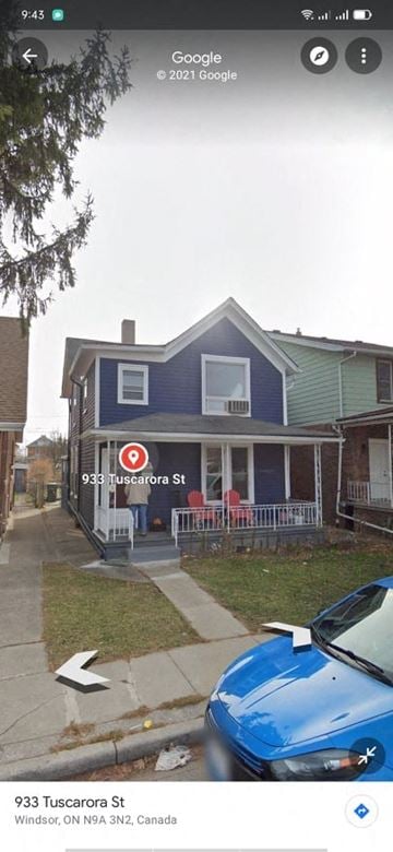 Windsor apartment for rent - a blue house with a blue car parked in front of it