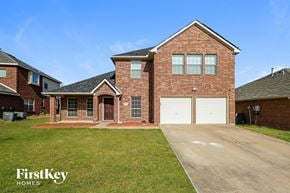Mesquite house for rent - A brick house with a garage is for sale.