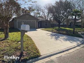 Jacksonville house for rent - a street with a mailbox in front of a house