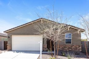 Tolleson house for rent - A house with a garage and a driveway.