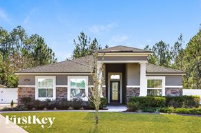 Jacksonville house for rent - a house with a lawn in front of it