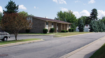 Ypsilanti apartment for rent - a house with a car parked in front of it on a street