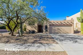 Oro Valley house for rent - A house with a cactus in front of it.