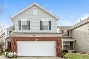 Indianapolis house for rent - A two-story house with a garage is for sale.