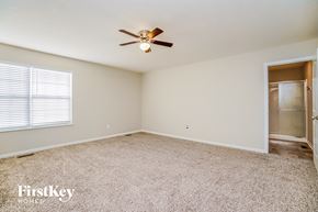 Commercial Point house for rent - an empty bedroom with a ceiling fan and a closet