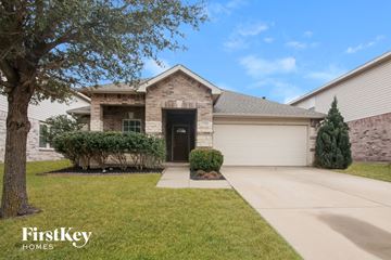 Burleson house for rent - a brick house with a sidewalk in front of it