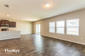Jacksonville house for rent - the living room and kitchen of an empty house