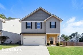 Ball Ground house for rent - A two-story house with a garage is for sale.