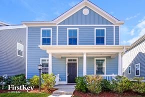 Summerville house for rent - A blue house with a white trim and a black door.