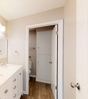 Crown Point apartment for rent - an empty bathroom with a door open to a closet