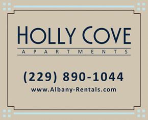 Moultrie apartment for rent - a beige banner with the words holly cove apartments