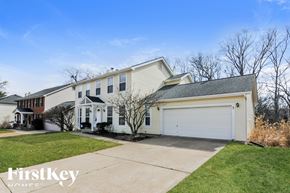 Ballwin house for rent - A two-story house with a garage is for sale.