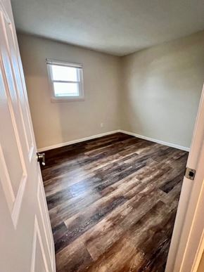 Columbus apartment for rent - A room with a wooden floor and a window.