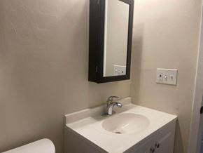 Columbus apartment for rent - a bathroom with a sink and a mirror