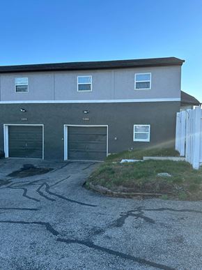Columbus apartment for rent - a building with two garage doors in front of it